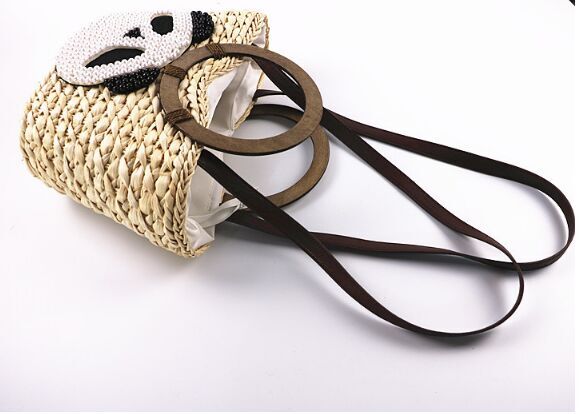 New Design Straw handbags with circle handle pom poms  crossbody bags manufacturer